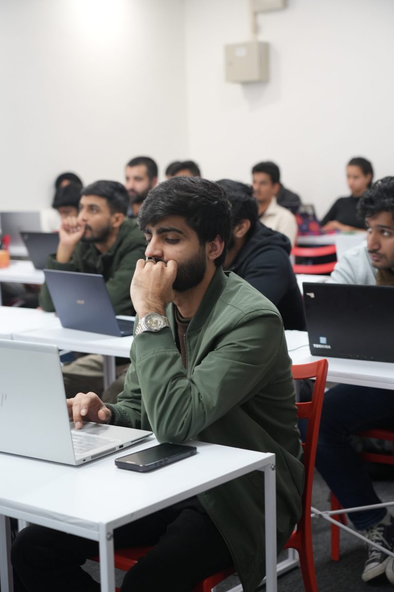 a boy sitting in classs for lectures