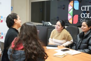 students are sitting in the class room of the city college